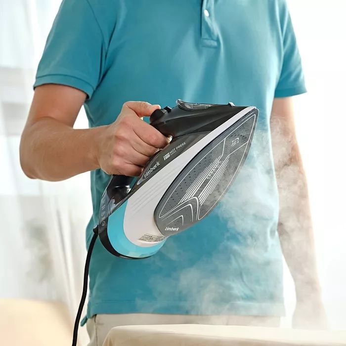 Как отпарить утюгом одежду? - 2